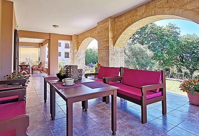 Terrace area with outdoor seating . - Iris Villa . (Photo Gallery) }}