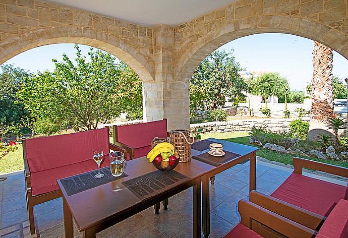 Terrace area with outdoor seating . - Iris Villa . (Photo Gallery) }}