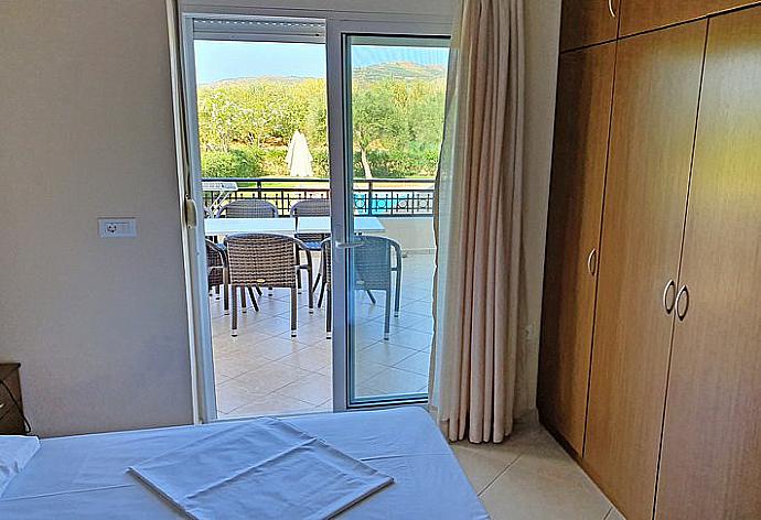 Double bedroom with balcony access  . - Villa Selini 4 . (Photo Gallery) }}