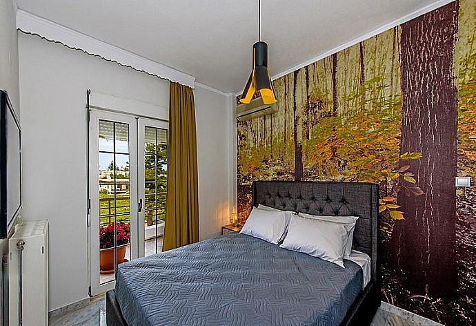 Double bedroom . - Platanias Villa Spyros . (Photo Gallery) }}