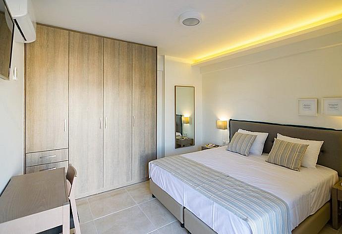Double bedroom with AC and TV . - Blue Oyster Beach Villa II . (Photo Gallery) }}