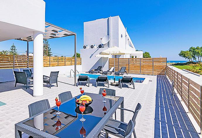 Terrace area with sea views . - Blue Oyster Beach Villa IV . (Photo Gallery) }}