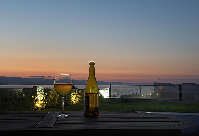 Sunset view from the villa  . - Grand Villa Athos . (Photo Gallery) }}