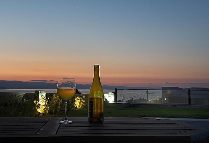 Sunset view from the villa  . - Grand Villa Athos . (Photo Gallery) }}