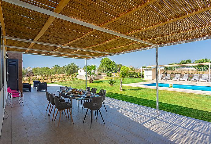 Sheltered terrace area . - Villa Akos . (Photo Gallery) }}