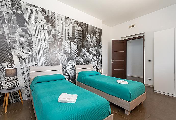 Twin bedroom with A/C . - Villa Akos . (Photo Gallery) }}