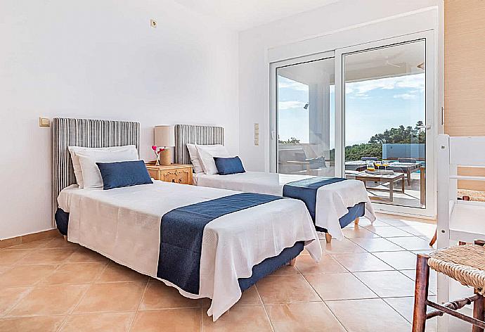 Twin bedroom  . - Villa Porfyra . (Photo Gallery) }}