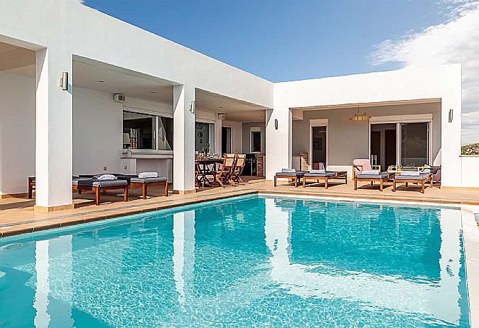 Private Pool with sunbeds  . - Villa Porfyra . (Photo Gallery) }}