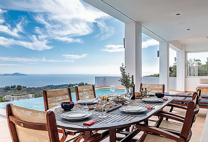 Outdoor dining  . - Villa Porfyra . (Photo Gallery) }}