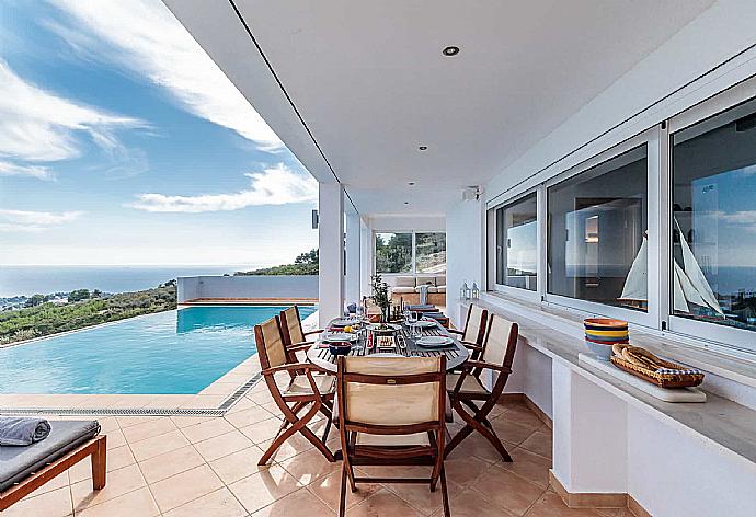 Private Pool with sunbeds and outdoor dinning  . - Villa Porfyra . (Photo Gallery) }}