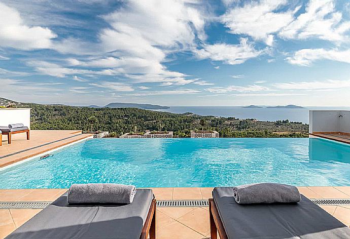 Pool sun beds  . - Villa Porfyra . (Photo Gallery) }}