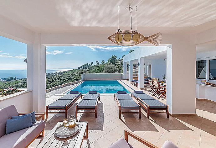 Private Pool with sunbeds and outdoor lounge  . - Villa Porfyra . (Photo Gallery) }}