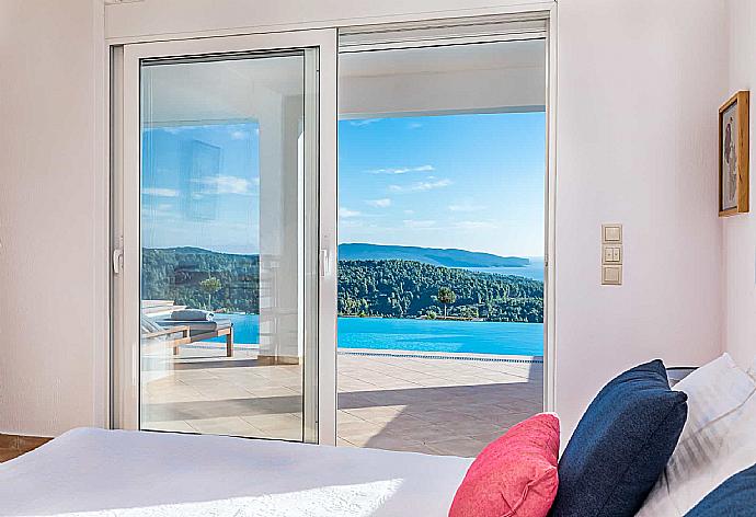 Double bedroom with outdoor access  . - Villa Porfyra . (Photo Gallery) }}