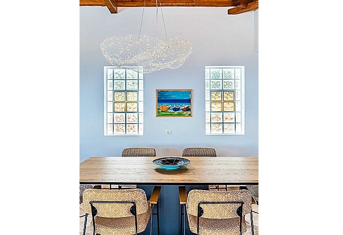 Indoor dining table  . - Villa Porfyra . (Photo Gallery) }}