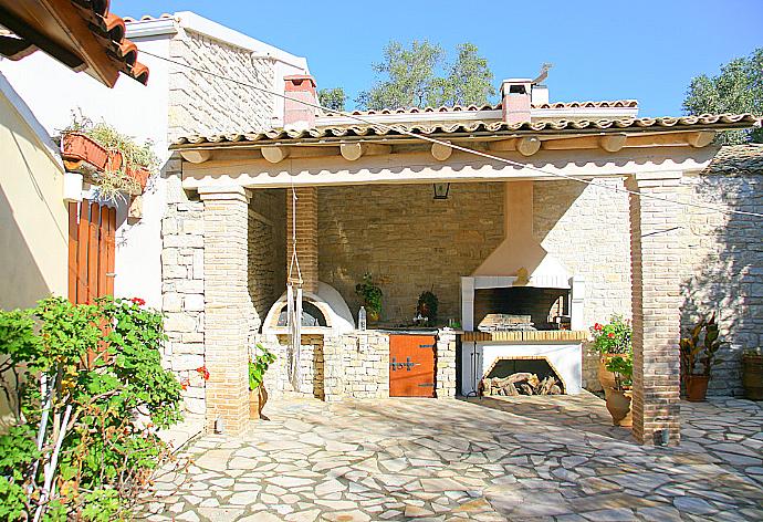Terrace with BBQ . - Villa Kostas . (Photo Gallery) }}