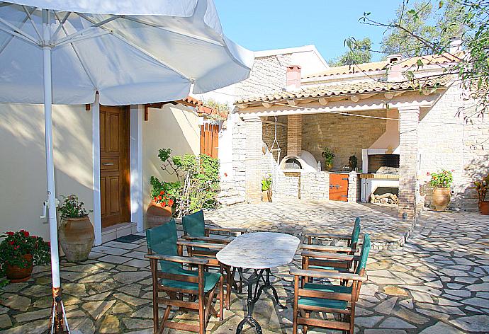 Terrace with BBQ . - Villa Kostas . (Photo Gallery) }}