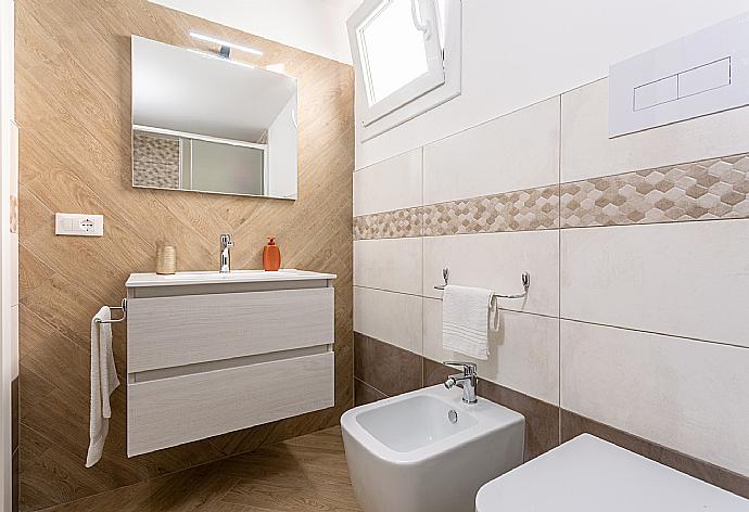 En suite bathroom with shower . - Villa Marianna . (Галерея фотографий) }}