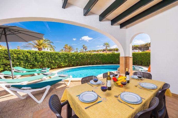 Sheltered terrace area . - Villa Juana . (Photo Gallery) }}