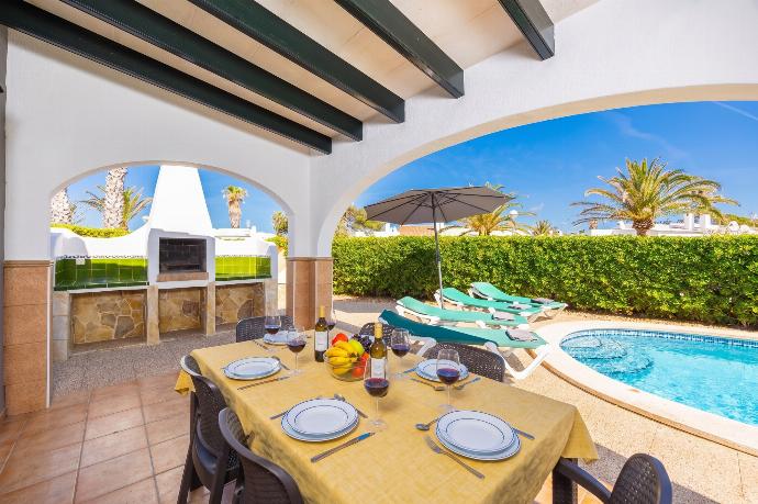 Sheltered terrace area . - Villa Juana . (Photo Gallery) }}