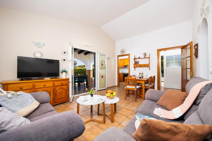 Living room with sofa, dining area, WiFi internet, and satellite TV . - Villa Juana . (Photo Gallery) }}
