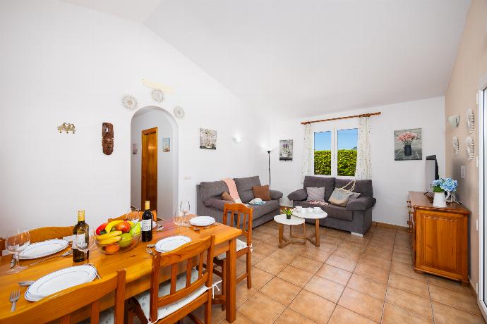 Living room with sofa, dining area, WiFi internet, and satellite TV . - Villa Juana . (Photo Gallery) }}