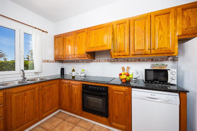 Equipped kitchen . - Villa Juana . (Photo Gallery) }}