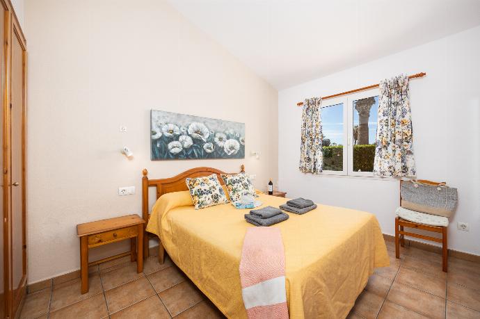 Double bedroom with en suite bathroom and A/C . - Villa Juana . (Photo Gallery) }}