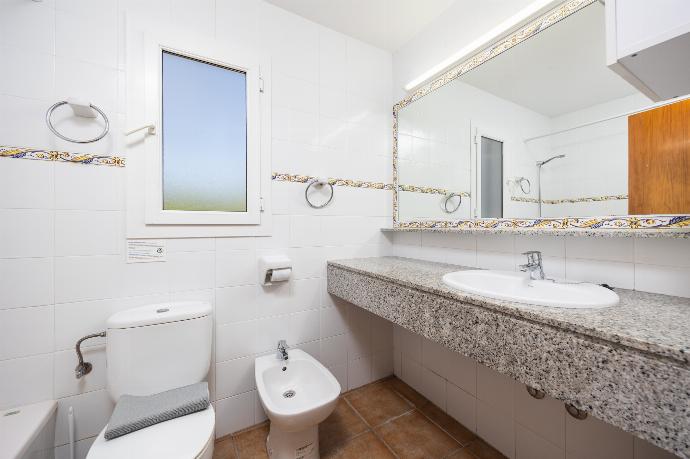 Family bathroom with bath and shower . - Villa Juana . (Photo Gallery) }}