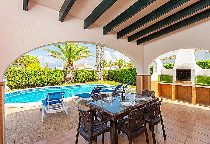 Sheltered terrace area with BBQ . - Villa Clariana . (Fotogalerie) }}