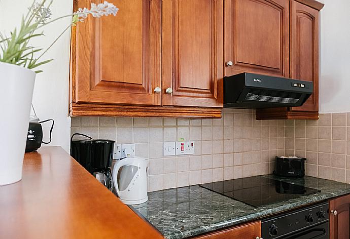 Kitchen  . - Villa Aphrodite . (Fotogalerie) }}