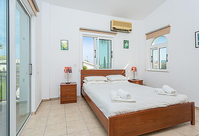 Double bedroom with A/C and balcony access . - Villa Cleopatra . (Galleria fotografica) }}