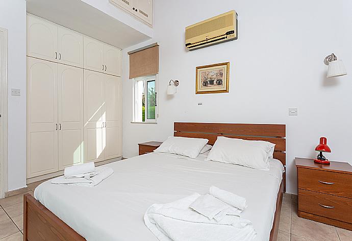 Double bedroom with A/C and terrace access . - Villa Cleopatra . (Photo Gallery) }}