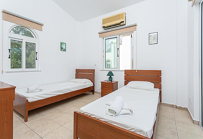 Twin bedroom with A/C and balcony access . - Villa Cleopatra . (Photo Gallery) }}