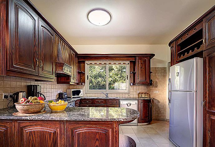 Kitchen  . - Villa Niki . (Fotogalerie) }}