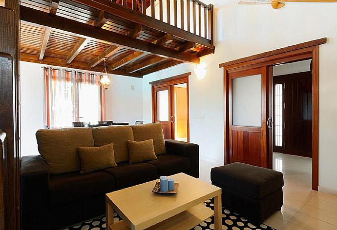 Living room with sofas, dining area, WiFi internet, satellite TV, and DVD player . - Villa Bene . (Photo Gallery) }}