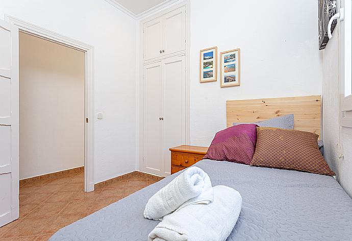 Single bedroom with A/C . - Villa Torreta . (Photo Gallery) }}