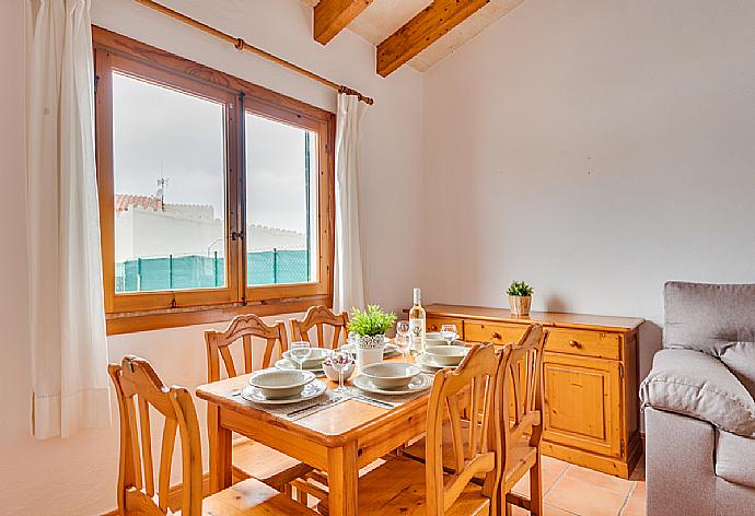 Open-plan living room with sofas, dining area, kitchen, WiFi internet, satellite TV, DVD player, and pool terrace access . - Villa Mar i Mar . (Galleria fotografica) }}