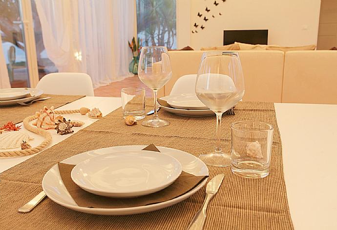 Living room with sofa, dining area, A/C, WiFi internet, and satellite TV . - Villa Lory . (Photo Gallery) }}