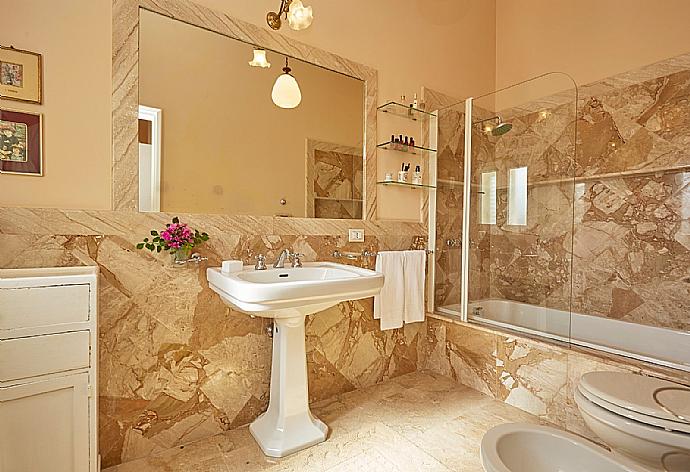 Bathroom with bath and shower . - Villa Nature's Embrace . (Photo Gallery) }}