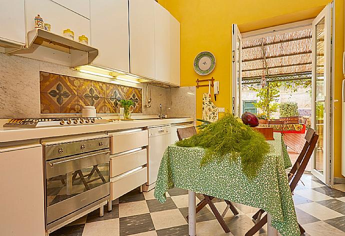 Equipped kitchen . - Villa Nature's Embrace . (Photo Gallery) }}