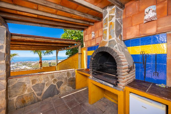 Sheltered terrace area with BBQ . - Villa Benizan . (Photo Gallery) }}