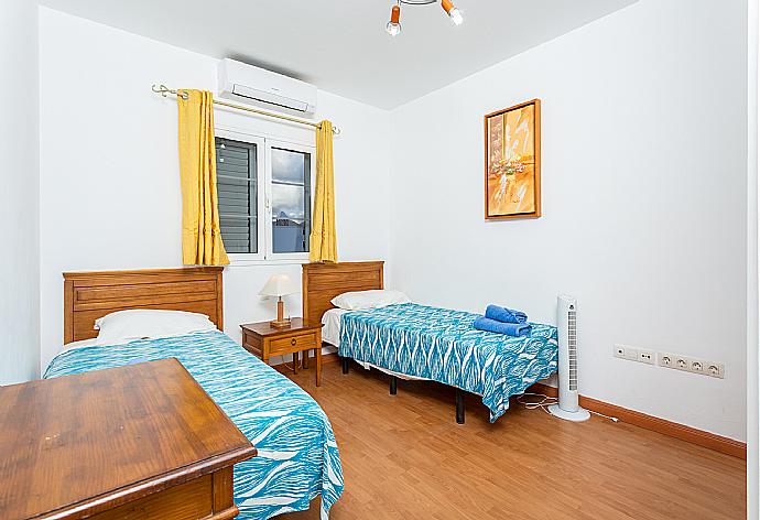 Twin bedroom with A/C . - Villa Candela . (Photo Gallery) }}