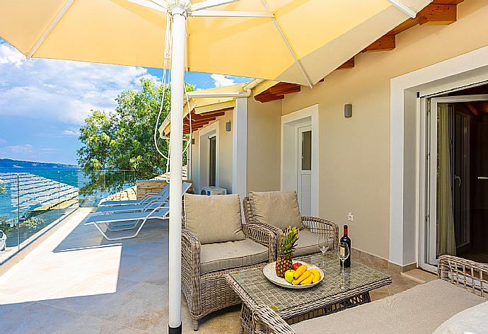 Terrace area with sea views . - Villa Nikolakis . (Photo Gallery) }}