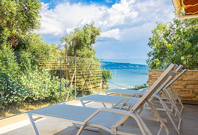 Terrace area with sea views . - Villa Nikolakis . (Photo Gallery) }}