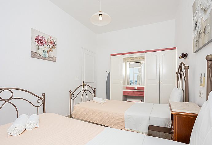 Twin bedroom with A/C and balcony access with sea views . - Villa Kalithea . (Photo Gallery) }}
