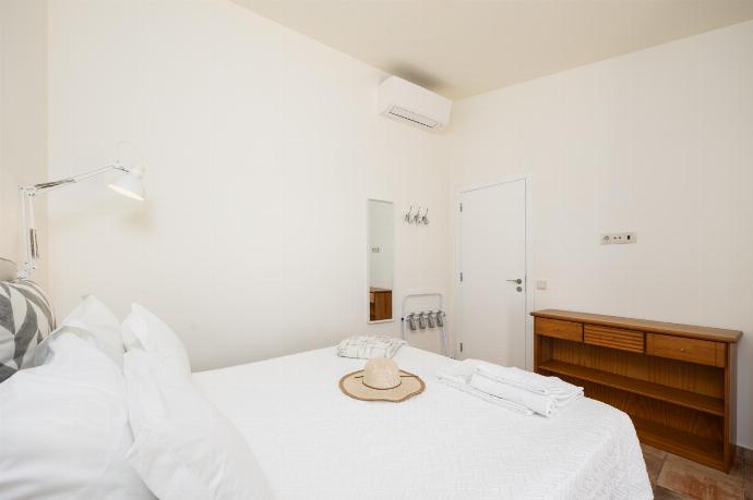 Double bedroom with A/C . - Casa do Carmo . (Photo Gallery) }}