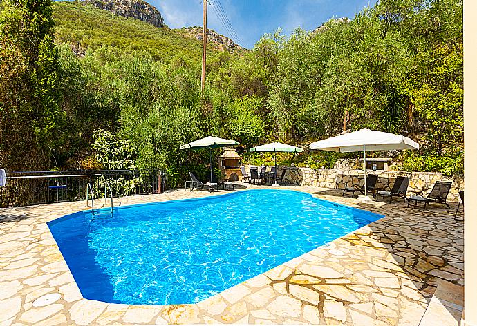 Private pool and terrace with sea views . - Villa Evie . (Photo Gallery) }}