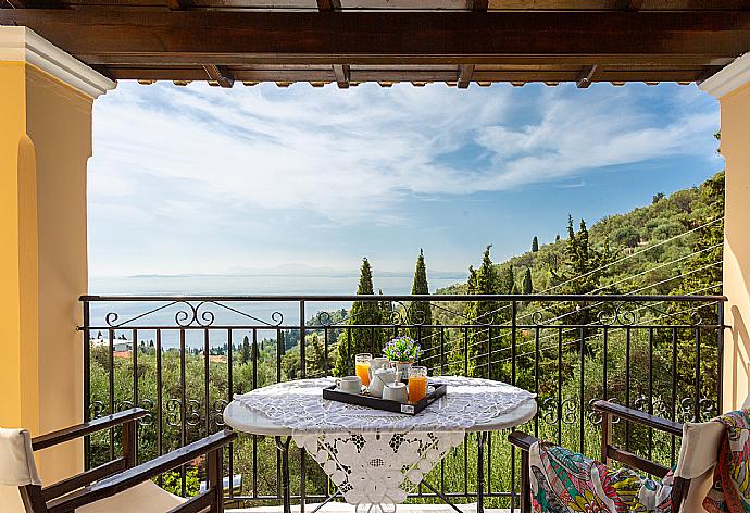 Balcony with sea views . - Villa Evie . (Photo Gallery) }}