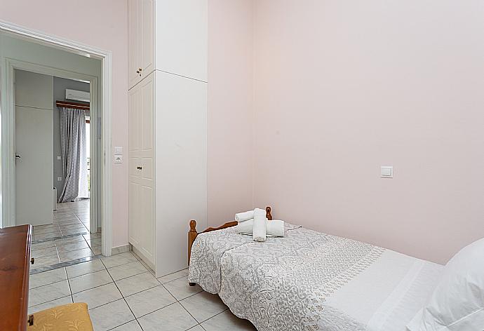 Single bedroom with A/C . - Villa Evie . (Photo Gallery) }}