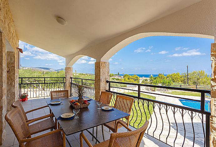 Sheltered terrace area with sea views . - Villa Thea . (Photo Gallery) }}
